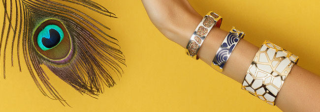 An image of three bracelets with a turquoise stone