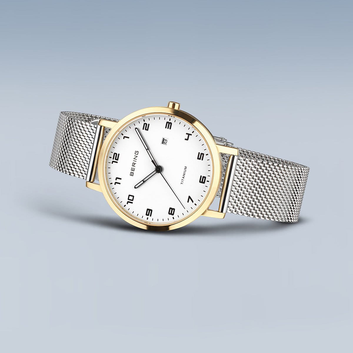 Bering Titanium Polished/Brushed Gold Quartz Watch 18634-010 - Michael Jones Jeweller