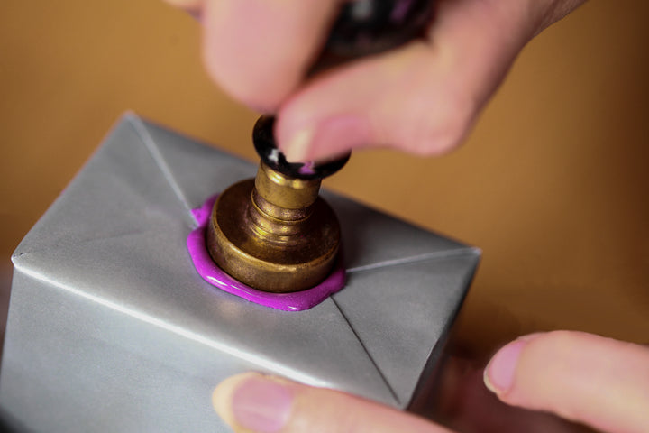 Michael Jones purple wax seal