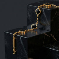 Steel and Barnett Lucky Clover Black Onyx Charm Bracelet In 18ct Plated Gold