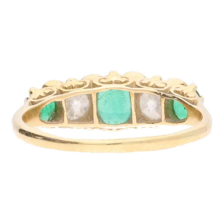 Pre-Owned Emerald and Diamond Ring