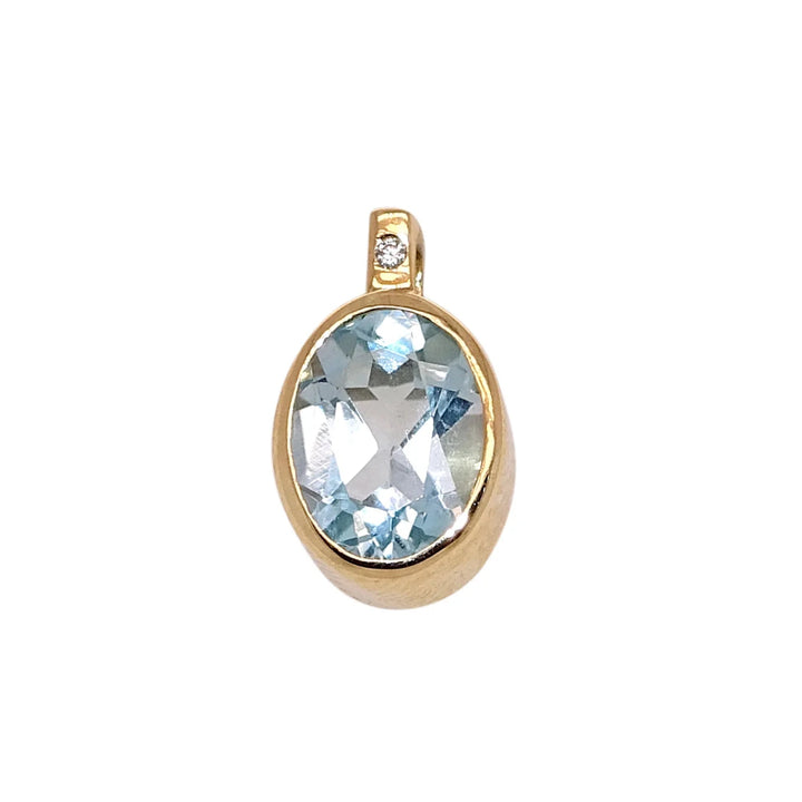 Blue Topaz and CZ 9ct Yellow Gold Pendant