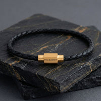 Steel and Barnett Luke Landon Thin Braided Black Leather Men's Bracelet with a Plated 18ct Yellow Clasp - Medium