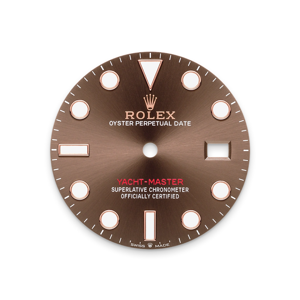 Rolex watch dial with brown background and gold text.