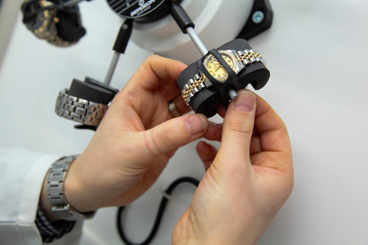 Michael Jones Jeweller team member servicing a watch