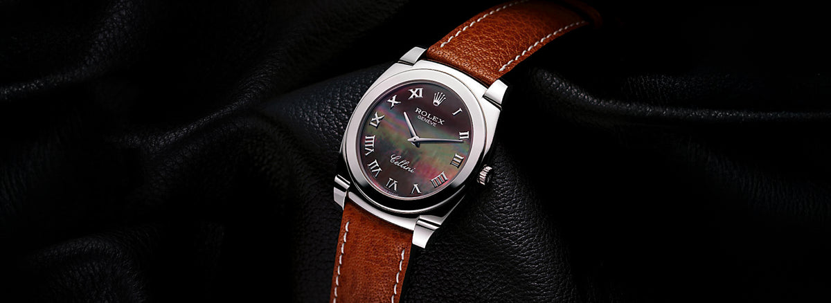 Rolex Cellini Watch with a brown leather strap on a dark background
