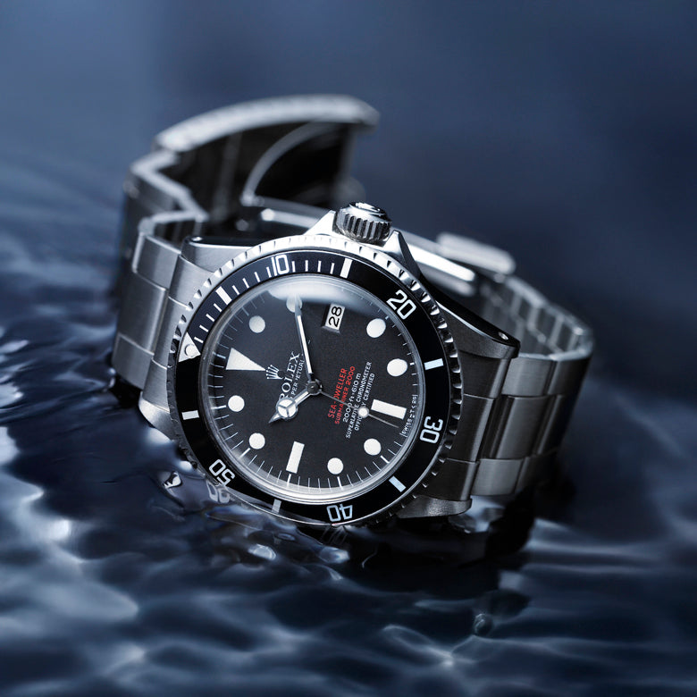 Rolex Sea-dweller watch with black dial on water