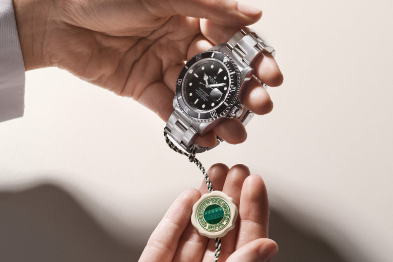 Rolex Certified Pre-Owned watch with a close up of the official swing tag.