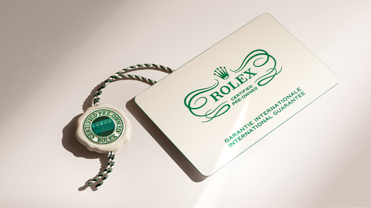 Rolex Certified Pre-Owned watch guarantee card and swing tag