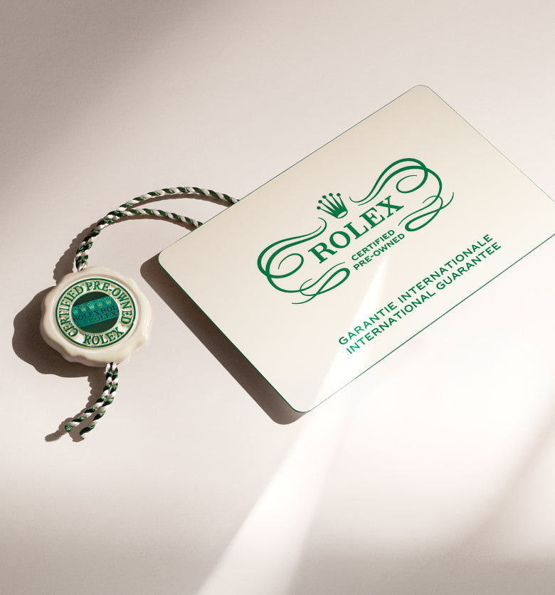 Rolex Certified Pre-Owned guarantee card and swing tag