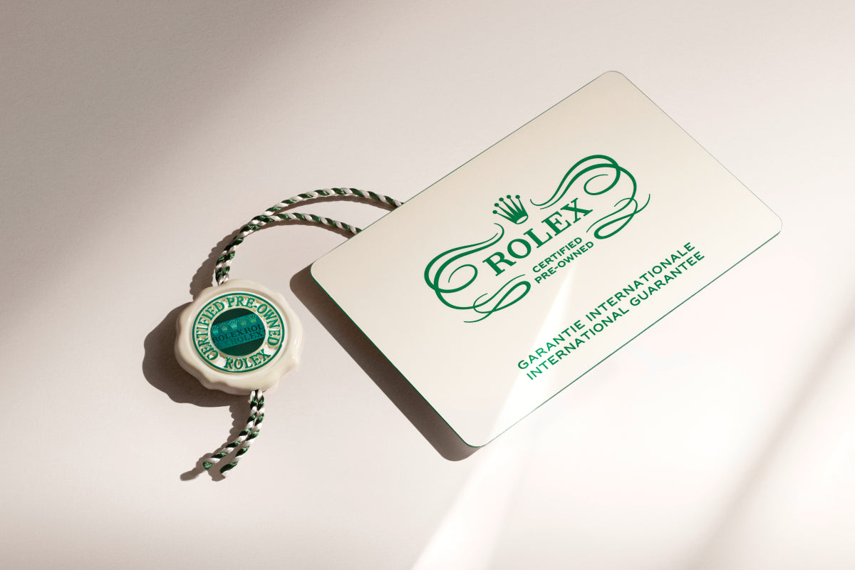 Rolex Certified Pre-Owned watch guarantee card and swing tag