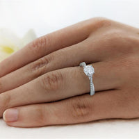 Skye Twist Solitaire 0.70ct E SI1 Diamond Platinum Ring
