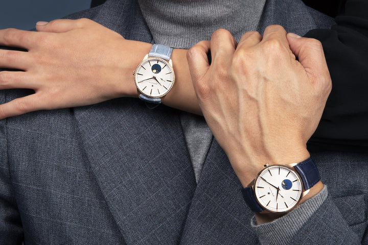 Models wearing his and hers Zenith watches