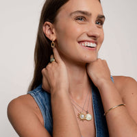 Ti Sento Yellow Gold Plated Turquoise Blue and Cubic Zirconia Sun Disc Pendant - Michael Jones Jeweller