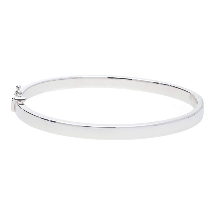 Polished Flat Oval 9ct White Gold Bangle - Michael Jones Jeweller