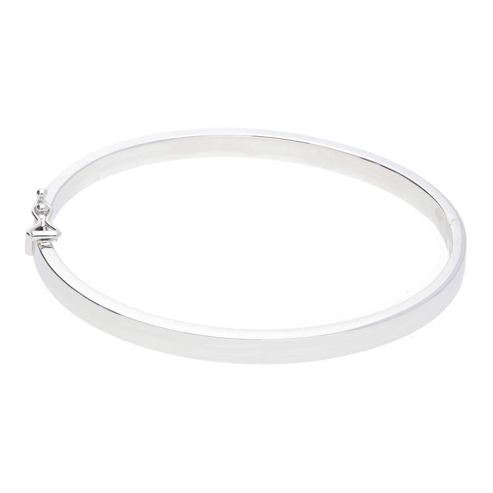 Polished Flat Oval 9ct White Gold Bangle - Michael Jones Jeweller
