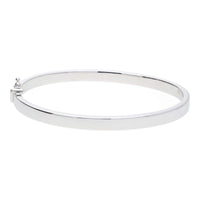 Polished Flat Oval 9ct White Gold Bangle - Michael Jones Jeweller