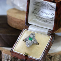 Pre-Owned Emerald and Diamond Boat Shaped Ring