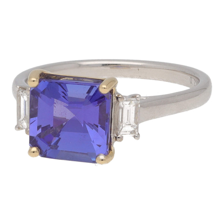 Tanzanite and Diamond Step Cut 18ct Yellow and White Gold Three Stone Ring