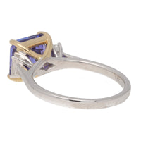 Tanzanite and Diamond Step Cut 18ct Yellow and White Gold Three Stone Ring