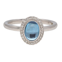 Ntinga Cabochon Blue Topaz and Diamond Oval 9ct White Gold Cluster Ring