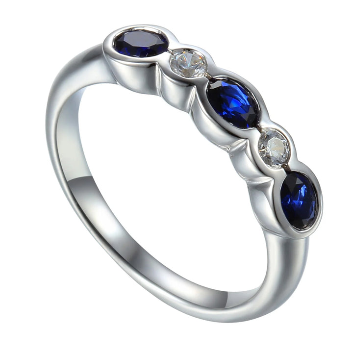 Blue Sapphire and Diamond 18ct White Gold Oval Rub Over Half Eternity Ring