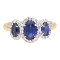 Blue Sapphire and Diamond Oval Three Stone 18ct Yellow Gold Cluster Ring