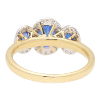 Blue Sapphire and Diamond Oval Three Stone 18ct Yellow Gold Cluster Ring